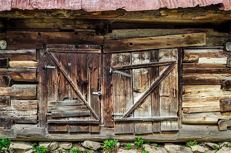 Detail of old wooden textured and weathered barn door, Vlkolinec village, Slovakia Foto de stock - Super Valor sin royalties y Suscripción, Código: 400-07619106