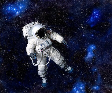 American Astronaut wearing pressure suit against a space background. Stock Photo - Budget Royalty-Free & Subscription, Code: 400-07613761