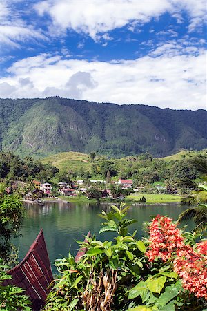 View from Tuk-Tuk Village to Samosir. Lake Toba, North Sumatra, Indonesia. Foto de stock - Super Valor sin royalties y Suscripción, Código: 400-07613771