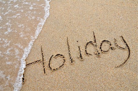 summer beach postcard - Holiday word written on sandy beach Stock Photo - Budget Royalty-Free & Subscription, Code: 400-07624978