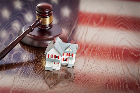 eviction - Small House and Gavel on Wooden Table with American Flag Reflection. Stock Photo - Budget Royalty-Free & Subscription, Code: 400-07627644