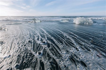 skaftafell, iceland - Melting ice on beach near Jokulsarlon in Iceland Stock Photo - Budget Royalty-Free & Subscription, Code: 400-07627665