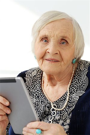 Close-up. Cute, elderly woman with happy face Stock Photo - Budget Royalty-Free & Subscription, Code: 400-07627823