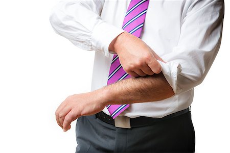 Business man in suit and a white shirt with tie rolls up his sleeves, isolated on white background Stock Photo - Budget Royalty-Free & Subscription, Code: 400-07628282