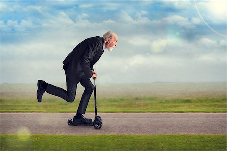 senior man riding a scooter active and energetic Stock Photo - Budget Royalty-Free & Subscription, Code: 400-07628870