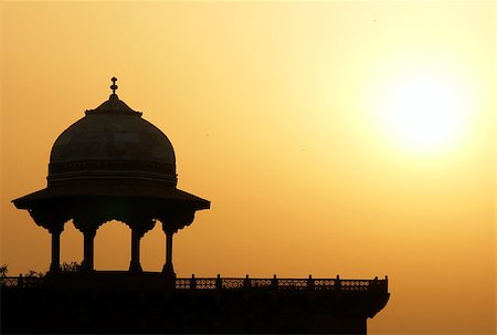 silhouettes indian monuments - Moslem fortress silhouette at sunrise. Taj Mahal, Agra, India Stock Photo - Budget Royalty-Free & Subscription, Code: 400-07628941