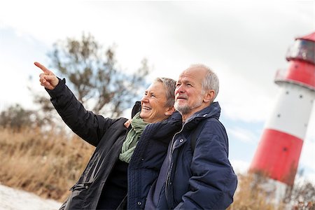 happy mature couple relaxing baltic sea dunes in autumn Stock Photo - Budget Royalty-Free & Subscription, Code: 400-07629869