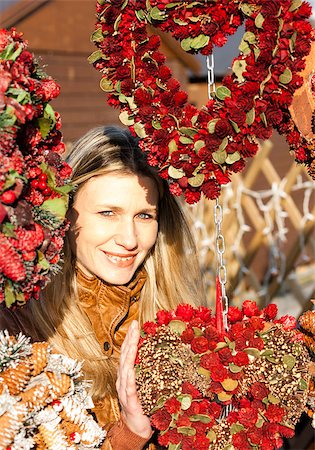 portrait of woman at Christmas market, Vienna, Austria Stock Photo - Budget Royalty-Free & Subscription, Code: 400-07620200