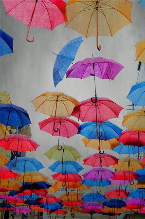 Colorfull umbrellas on textured background Stock Photo - Budget Royalty-Free & Subscription, Code: 400-07620215