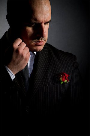 Portrait of man, godfather-like character. Photographie de stock - Aubaine LD & Abonnement, Code: 400-07620625