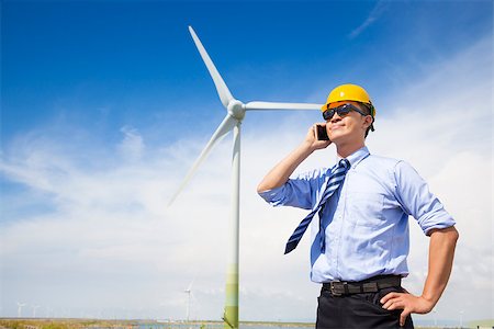 engineer background - professional business standing with wind generator Stock Photo - Budget Royalty-Free & Subscription, Code: 400-07620792