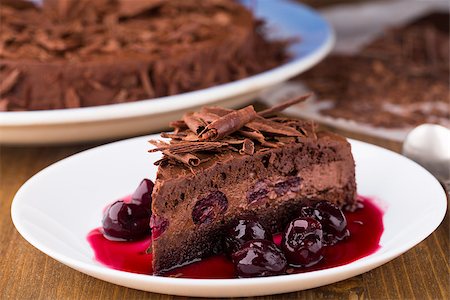 dark chocolate curl - Delicious chocolate mousse cake with dark cherries Stock Photo - Budget Royalty-Free & Subscription, Code: 400-07621030