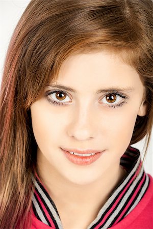 Studio fashion portrait of young beautiful girl with nice eyes on white background Stock Photo - Budget Royalty-Free & Subscription, Code: 400-07621048