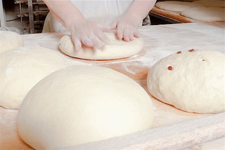 simsearch:400-07615342,k - Professional Bakery - Baker Working with Dough. Stock Photo - Budget Royalty-Free & Subscription, Code: 400-07621283