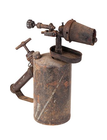 Old rusty blowtorch isolated on white background Fotografie stock - Microstock e Abbonamento, Codice: 400-07621411