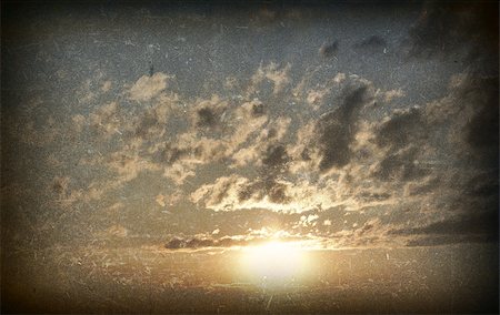 Evening blue sky. Clouds and sunset gold color. Grunge style Stock Photo - Budget Royalty-Free & Subscription, Code: 400-07621525