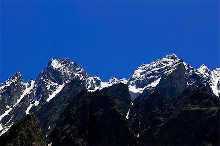 simsearch:400-04412215,k - Caucasus mountains under snow and clear blue sky Photographie de stock - Aubaine LD & Abonnement, Code: 400-07621776