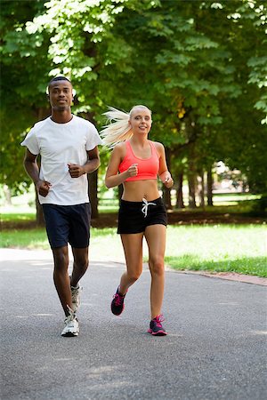 simsearch:400-07682342,k - young couple runner jogger in park outdoor summer sport lifestyle Stock Photo - Budget Royalty-Free & Subscription, Code: 400-07622216