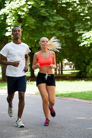 simsearch:400-07682342,k - young couple runner jogger in park outdoor summer sport lifestyle Stock Photo - Budget Royalty-Free & Subscription, Code: 400-07622217