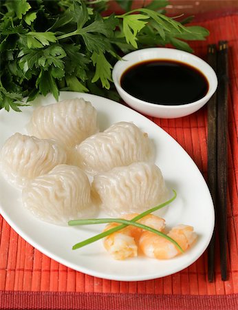 simsearch:400-04025064,k - Asian steamed meat dumplings dim sum with soy sauce Stock Photo - Budget Royalty-Free & Subscription, Code: 400-07622560