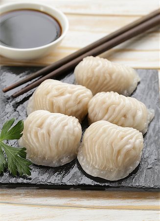 simsearch:400-04025064,k - Asian steamed meat dumplings dim sum with soy sauce Stock Photo - Budget Royalty-Free & Subscription, Code: 400-07622561