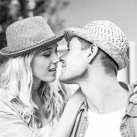 Hip young couple about to kiss in black and white Stock Photo - Budget Royalty-Free & Subscription, Code: 400-07623448