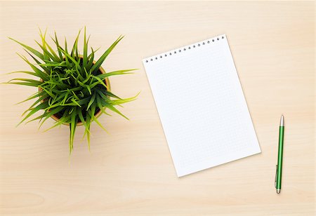 simsearch:400-07481880,k - Blank notepad, pen and flower on wooden table. View from above Fotografie stock - Microstock e Abbonamento, Codice: 400-07623572