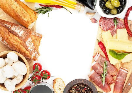 simsearch:400-07481818,k - Red wine with cheese, prosciutto, bread, vegetables and spices. Isolated on white background with copy space Foto de stock - Super Valor sin royalties y Suscripción, Código: 400-07623732