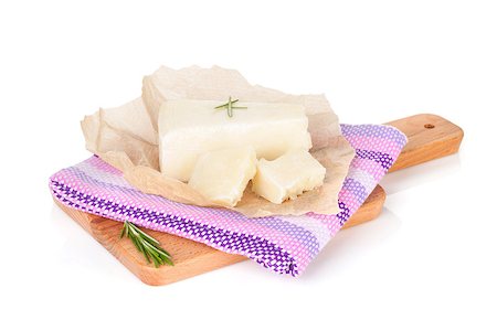simsearch:400-06919923,k - Parmesan cheese on cutting board. Isolated on white background Stockbilder - Microstock & Abonnement, Bildnummer: 400-07623792