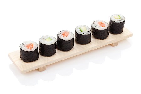 simsearch:400-08072780,k - Sushi maki with salmon and cucumber. Isolated on white background Photographie de stock - Aubaine LD & Abonnement, Code: 400-07623843