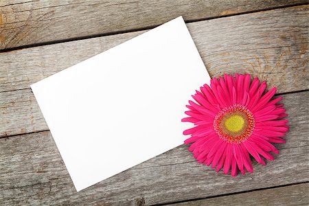 simsearch:400-07662543,k - Photo frame and gerbera flower over wooden table background Stock Photo - Budget Royalty-Free & Subscription, Code: 400-07623889