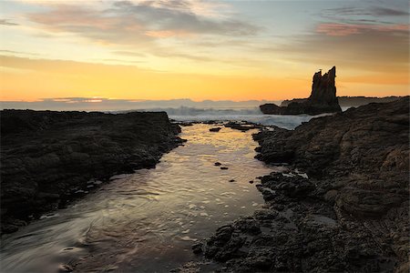 simsearch:400-07514503,k - Waves crashing around Cathedral Rock at sunrise, south coast, NSW, Australia Stock Photo - Budget Royalty-Free & Subscription, Code: 400-07634001