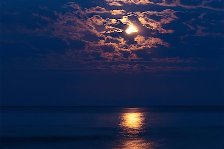 simsearch:400-05666428,k - Full moon in night sky over moonlit water Stock Photo - Budget Royalty-Free & Subscription, Code: 400-07634115