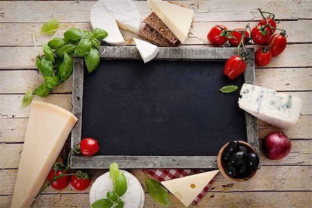 recipes paper - Italian cooking. Fresh ingredients with pasta for italian cuisine. Cheese variety on chalk board Stock Photo - Budget Royalty-Free & Subscription, Code: 400-07631802