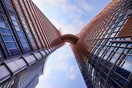 futuristic bank - HONG KONG, CHINA - L'hotel Nina et Convention Centre Hong Kong is a 5-star hotel consists of 2 towers - 42 storeys and  89 storeys Hong Kong, Stock Photo - Budget Royalty-Free & Subscription, Code: 400-07633395