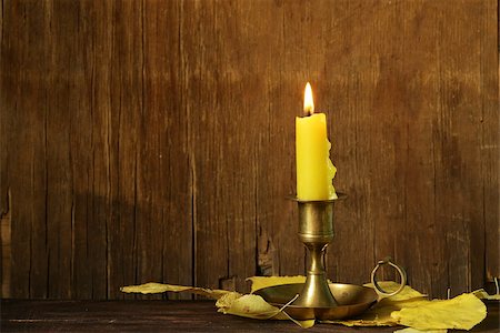 simsearch:614-01561575,k - vintage candlestick with candle on the wooden background Stock Photo - Budget Royalty-Free & Subscription, Code: 400-07633552