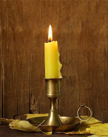 simsearch:400-08096998,k - vintage candlestick with candle on the wooden background Stockbilder - Microstock & Abonnement, Bildnummer: 400-07633553