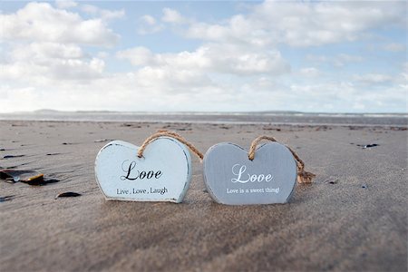 simsearch:400-08495448,k - two inscribed wooden love hearts in the sand on a wild Atlantic way Irish beach in summer Stock Photo - Budget Royalty-Free & Subscription, Code: 400-07656549