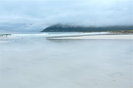 ramberg - Summer cloudy view of the beach with white sand in Ramberg (Norway, Lofoten). Fotografie stock - Microstock e Abbonamento, Codice: 400-07658078