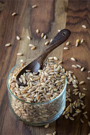 simsearch:400-08428404,k - Loose grains of farro in a bowl with a spoon. Stock Photo - Budget Royalty-Free & Subscription, Code: 400-07658097