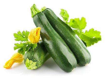 simsearch:400-07667021,k - Fresh zucchini with green leaf and flower. Isolated on white background Stock Photo - Budget Royalty-Free & Subscription, Code: 400-07658257