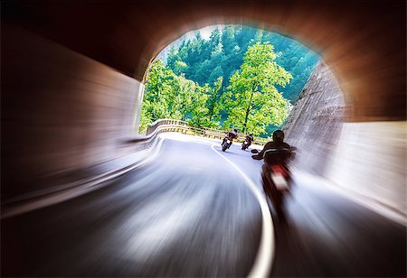 Group of bikers touring along European mountains, riding in tunnel, extreme lifestyle, slow motion, traveling and tourism concept Stock Photo - Budget Royalty-Free & Subscription, Code: 400-07658442