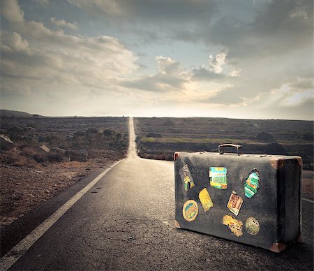 Luggage on a long road Stock Photo - Budget Royalty-Free & Subscription, Code: 400-07658546