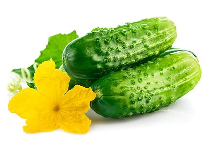 simsearch:400-07667021,k - Fresh cucumber in wooden box with green leaf and flower. Isolated on white background Stock Photo - Budget Royalty-Free & Subscription, Code: 400-07658895