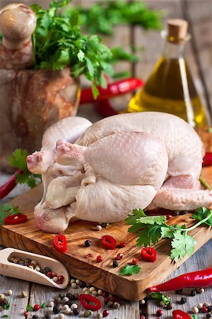 simsearch:400-07713408,k - Raw chicken with spices and cilantro ready to be prepared Stock Photo - Budget Royalty-Free & Subscription, Code: 400-07659068