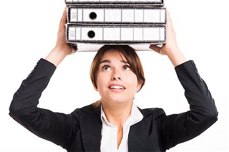 stressful women at the office with piles of work - Beautiful business woman tired of work and carrying lots of folders on hands, isolated over white background Stock Photo - Budget Royalty-Free & Subscription, Code: 400-07659287