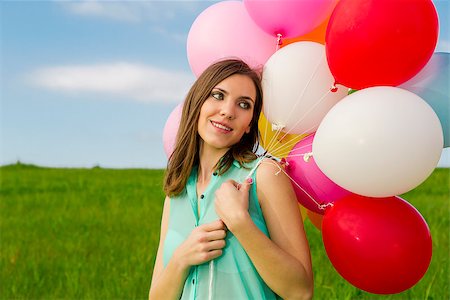 simsearch:400-06077546,k - Young beautiful woman with colorful balloons on a green meadow Stockbilder - Microstock & Abonnement, Bildnummer: 400-07659388