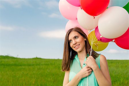 simsearch:400-06077546,k - Young beautiful woman with colorful balloons on a green meadow Stockbilder - Microstock & Abonnement, Bildnummer: 400-07659389