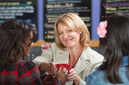 restaurant hostess - Happy restaurant manager with customers and coffee Stock Photo - Budget Royalty-Free & Subscription, Code: 400-07659869