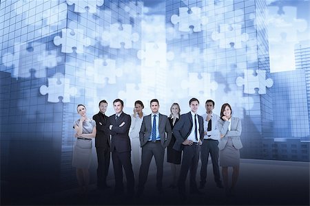 simsearch:400-07665756,k - Group of business partners looking at camera against jigsaw pattern Stock Photo - Budget Royalty-Free & Subscription, Code: 400-07664048